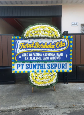 Papan Bunga Duka di Padang Jaya